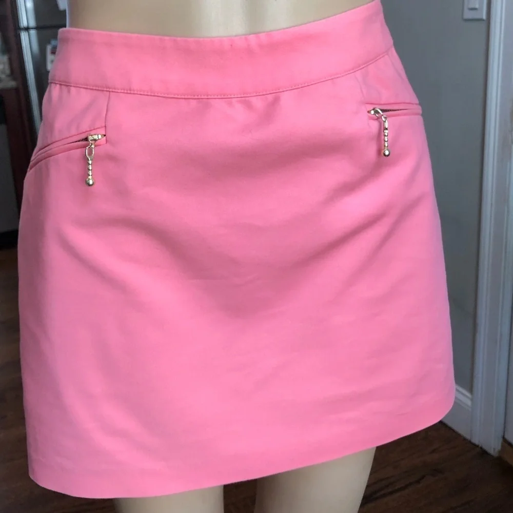 H&M coral mini skirt with front pockets